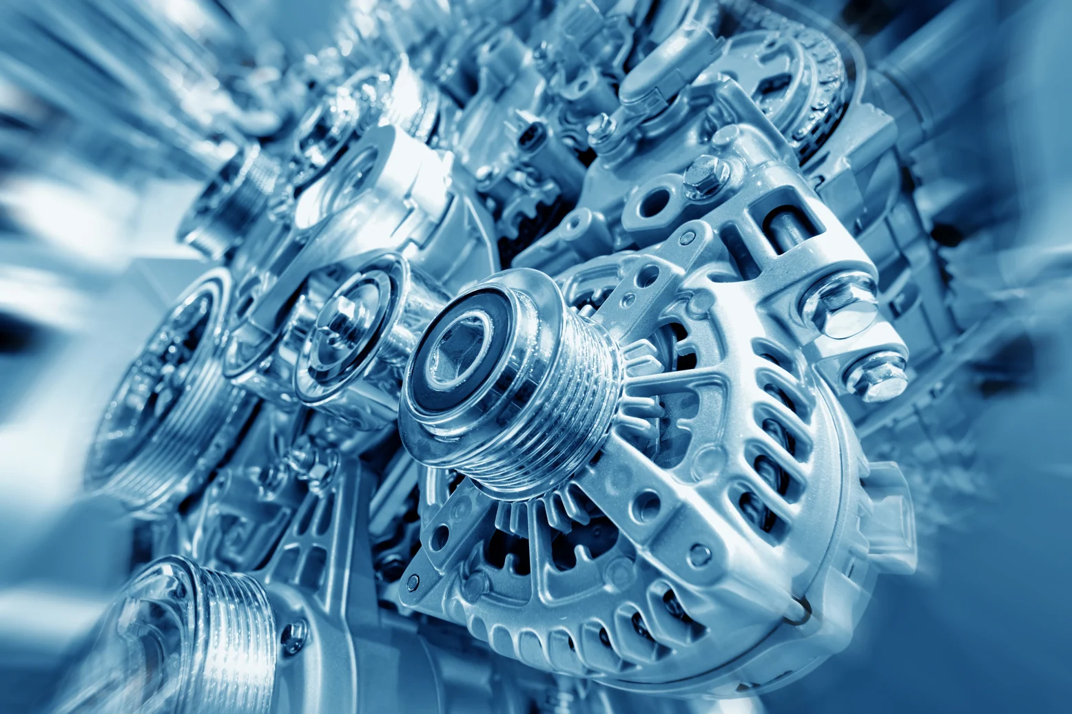 Close-up of industrial alternator and mechanical components